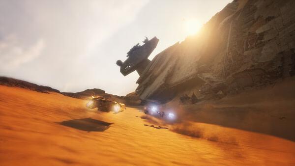 Screenshot from STAR WARS: Galactic Racer™ showing high-speed racers zooming past a crashed starship on a desert planet.
