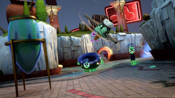 Screenshot from the game Kiln showing colorful clay characters in a whimsical, vibrant arena with floating objects.