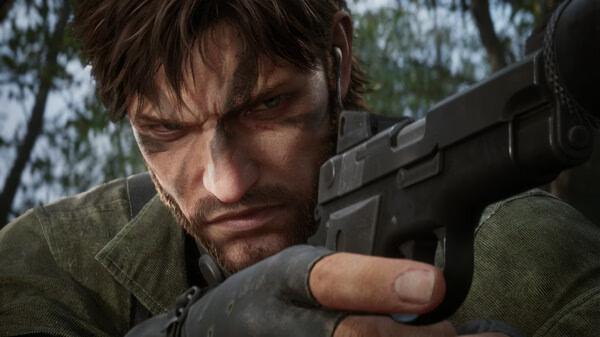 Screenshot from METAL GEAR SOLID Δ: SNAKE EATER showing a close-up of a character aiming a handgun in a forest setting.