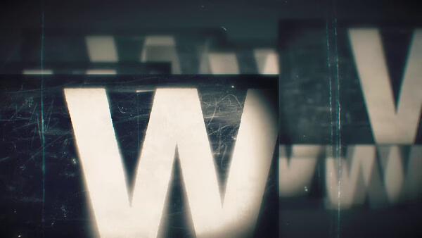 A Persona 6 screenshot showing a distorted letter "W" with a grungy, glitchy visual effect and layered textures.