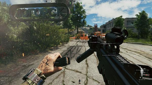 Screenshot from Active Matter showing a player's hand loading a magazine into a rifle, with a war-torn street in the background.