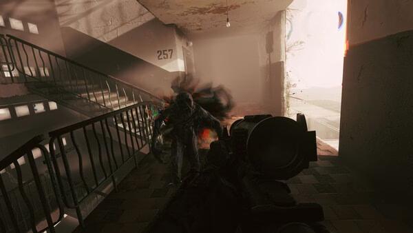 A screenshot from Active Matter showing a dark, shadowy figure approaching a player holding a scoped weapon in a dimly lit stairwell.