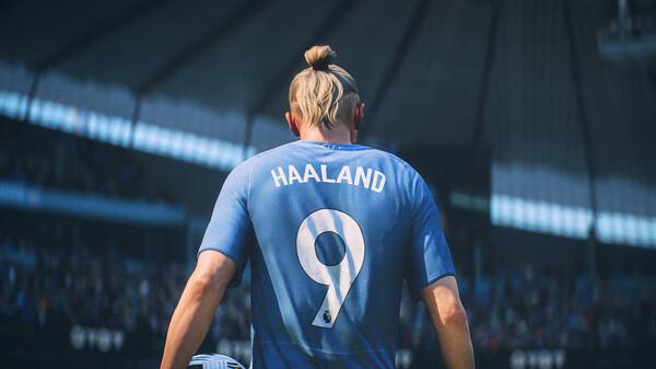 A screenshot from EA SPORTS FC 24 showing a player wearing a blue jersey with "HAALAND 9" on the back in a stadium.
