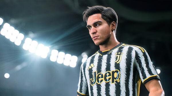A screenshot from EA SPORTS FC 24 showing a Juventus player in a black-and-white jersey under stadium lights.
