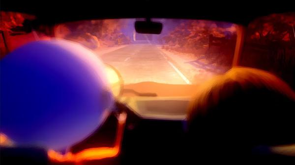 A screenshot from Last Day of June shows two characters in a car driving down a tree-lined road under a warm, glowing sunset.