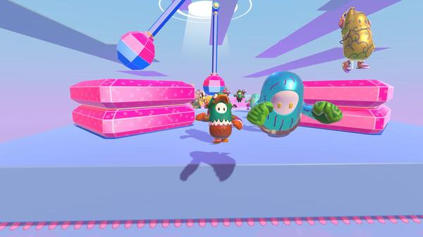 Fall Guys screenshot: Two colorful characters race on a candy-themed platform with swinging hammers in the background.