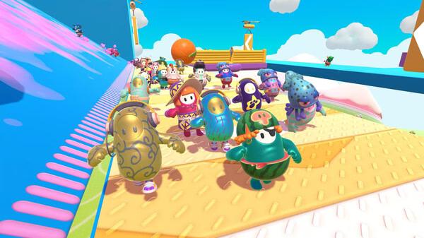 Fall Guys screenshot: A colorful group of bean-shaped characters race on a bright, obstacle-filled course under a blue sky.