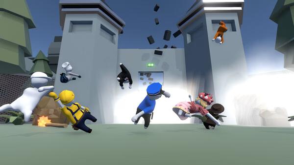 Screenshot from Human Fall Flat showing colorful characters in mid-air near a crumbling wall, with scattered debris.