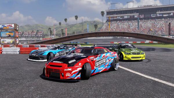 A CarX Drift Racing Online screenshot showcasing three custom drift cars on a racetrack with a stadium and hills in the background.