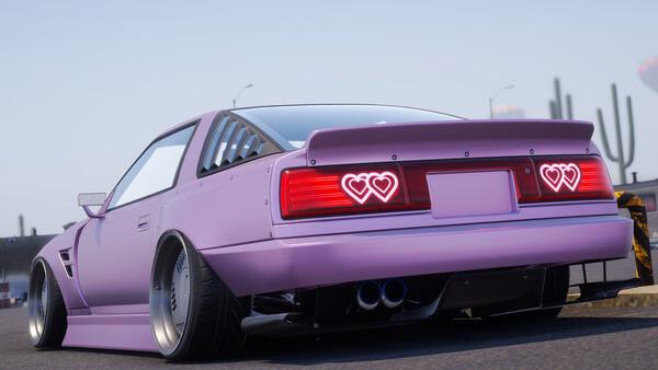A screenshot from CarX Drift Racing Online showing a customized purple car with heart-shaped taillights in a desert setting.