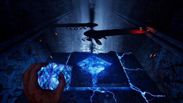 Clive Barker's Hellraiser: Revival screenshot showing a hand holding a glowing blue puzzle box with lightning.