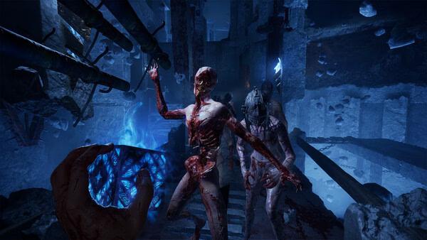 Clive Barker's Hellraiser: Revival screenshot showing a player holding a glowing puzzle box near mutilated cenobites