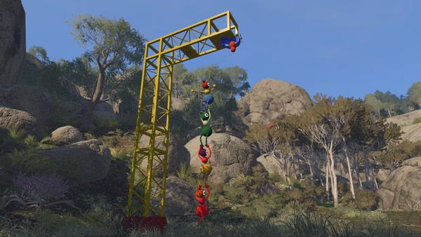 Big Walk screenshot: colorful characters dangling from a yellow metal beam over rocks.