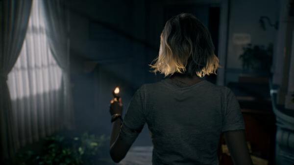 A screenshot from Resident Evil Requiem shows a character holding a lit candle, exploring a dimly lit, eerie room.