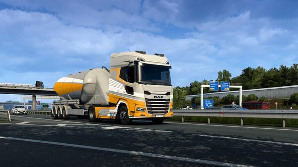 Screenshot from Euro Truck Simulator 2 showing a tanker truck on a highway with road signs and trees in the background.