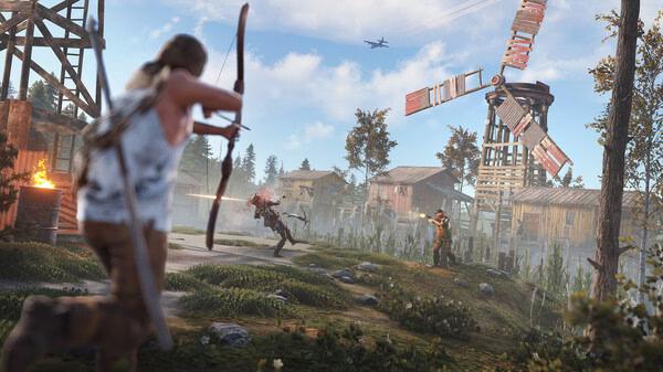 RUST screenshot: A player with a bow aims at another in a rustic village with a windmill, under a clear blue sky and flying aircraft.