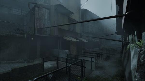 Silent Hill f screenshot: A foggy, abandoned town with dilapidated buildings, rusted pipes, and eerie, desolate surroundings.