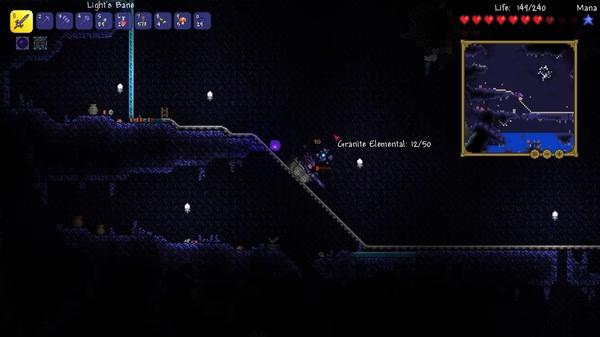 Terraria screenshot showing a player battling a Granite Elemental in a dark underground cave with glowing crystals and a minimap visible.