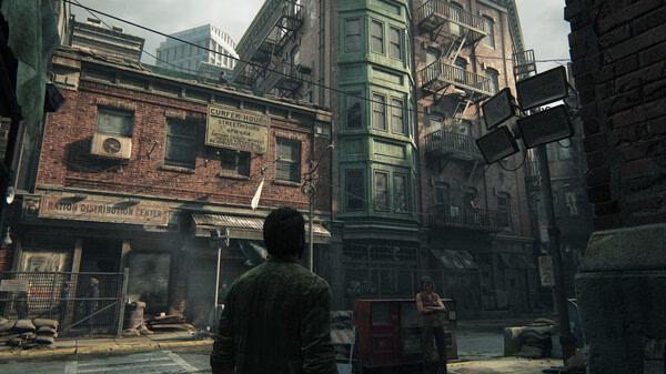 A screenshot from The Last of Us Part I showing Joel in a post-apocalyptic city street with damaged buildings and scattered debris.