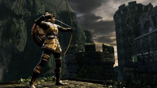 A screenshot from DARK SOULS™: REMASTERED showing a character aiming a bow amidst ancient stone ruins under a cloudy sky.