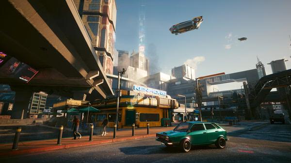 Screenshot from Cyberpunk 2077 showing a futuristic cityscape with a green car, flying vehicles, and towering buildings under a blue sky.