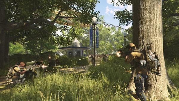 Screenshot from Tom Clancy’s The Division® 2 showing two agents in combat in a park with lush greenery and a gazebo.