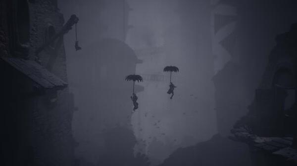 Screenshot from Little Nightmares III showing two characters using umbrellas to glide through a dark, eerie landscape.