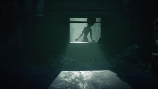 A screenshot from Little Nightmares III showing two small characters in a dark room with a shadowy figure visible through a window.