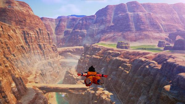 Screenshot from DRAGON BALL Z: KAKAROT showing Goku flying over a vast canyon with rocky cliffs and a river below.