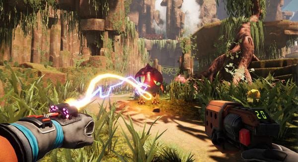 Screenshot from Journey To The Savage Planet shows a player using a gadget to attack a red alien creature in a lush, rocky landscape.