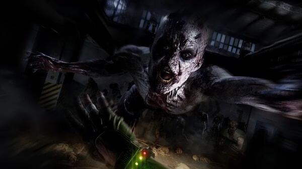 Dying Light 2 Stay Human: Reloaded Edition screenshot showing a terrifying zombie lunging towards the player in a dark room.