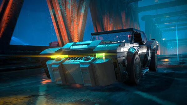 A screenshot from LEGO® Batman™: Legacy of the Dark Knight showing the Batmobile speeding across a rain-soaked bridge at night.