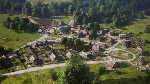 Screenshot from Manor Lords showing a medieval village with rustic houses and lush greenery in a serene landscape.