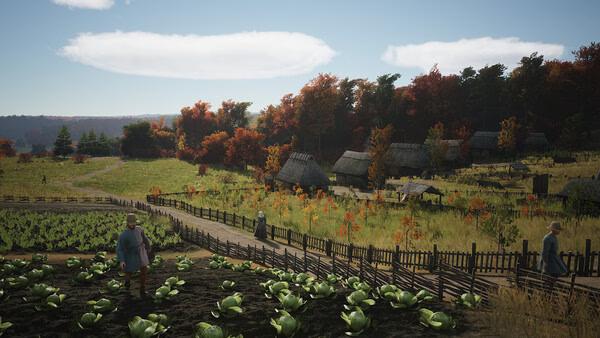 Screenshot from Manor Lords showing villagers tending to cabbage fields with rustic houses and autumn trees in the background.