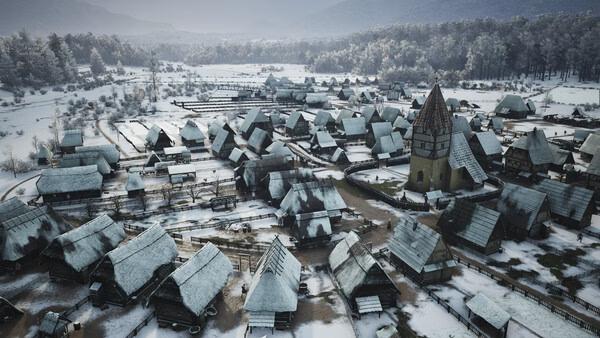 Manor Lords screenshot showing a snowy medieval village with wooden houses, a church, and surrounding forests.
