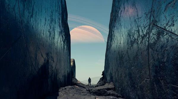 A Starfield screenshot shows a lone figure walking between two towering metallic cliffs with a ringed planet visible in the sky.