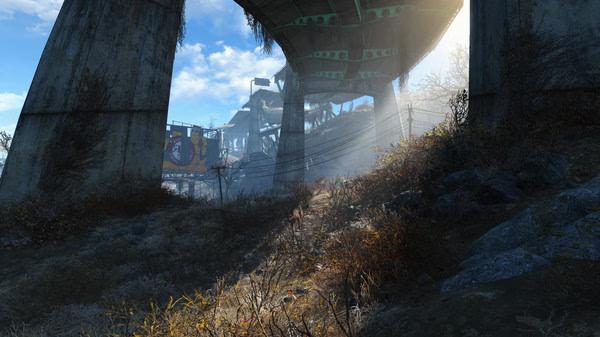 Fallout 4 screenshot showing a post-apocalyptic landscape under a highway bridge, with sunlight filtering through.