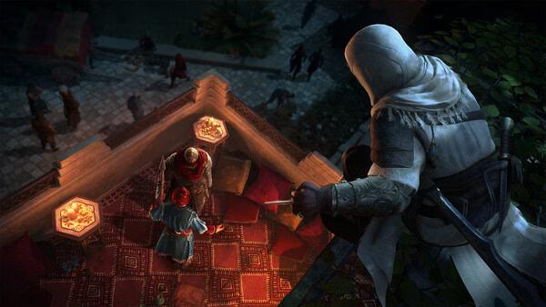 Assassin's Creed Mirage screenshot: A hooded assassin observes two figures speaking on a lit rooftop adorned with rugs and lanterns.