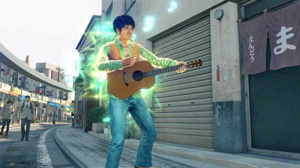 Screenshot from Yakuza: Like a Dragon shows a character playing guitar on a street, surrounded by glowing musical notes.