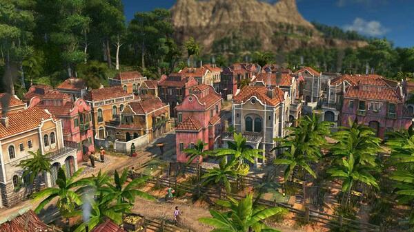 Screenshot from Anno 1800 depicting a vibrant colonial town with colorful buildings and lush greenery under a clear blue sky.