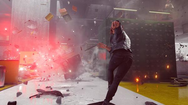 CONTROL Ultimate Edition screenshot: A character uses telekinetic powers to hurl objects in a chaotic office environment with red glowing effects.