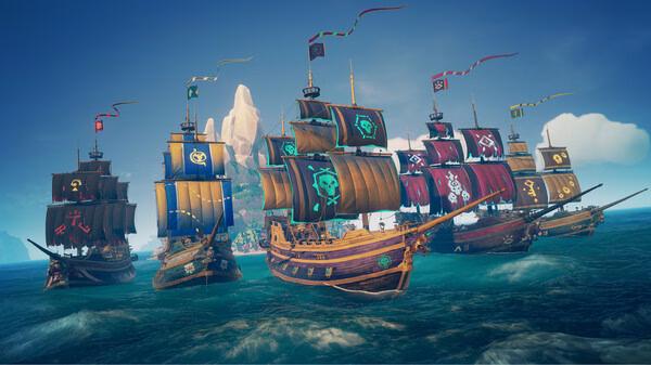 A screenshot from Sea of Thieves: 2026 Edition showing colorful pirate ships sailing on the ocean near rocky islands.