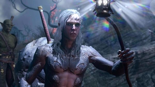 Screenshot from Baldur's Gate 3 showing a character with white hair holding a staff, surrounded by a mystical landscape.