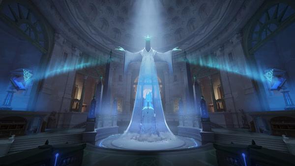 Screenshot from Deadlock showing a mystical statue in a grand hall, illuminated by ethereal blue light beams.