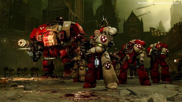 Total War: WARHAMMER 40,000 screenshot: Space Marines and a towering Dreadnought in a battle scene with gothic architecture in the background.