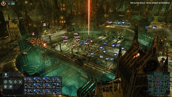 Total War: WARHAMMER 40,000 screenshot showing a massive battle with armies and laser fire in a futuristic, industrial cityscape.