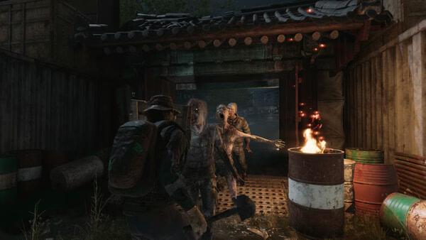 Screenshot from NAKWON: LAST PARADISE showing a player confronting a group of zombies near a burning barrel at night.