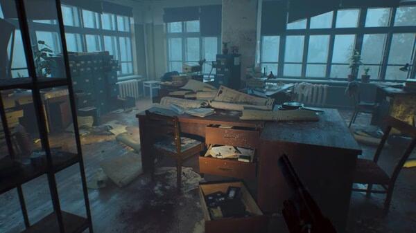 Screenshot from the game ILL showing a dimly lit, cluttered office with scattered papers and overturned furniture.