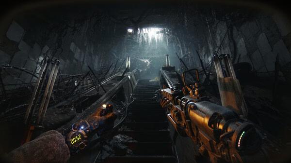 METRO 2039 screenshot: A player holds a rifle while ascending a dark, debris-filled staircase in an abandoned underground tunnel.
