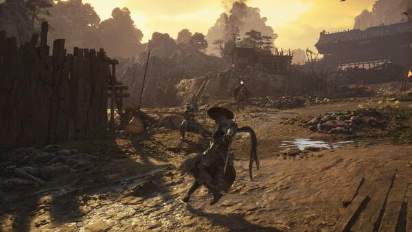 Screenshot from Phantom Blade Zero showing a warrior with a sword advancing in a rustic village landscape at sunset.